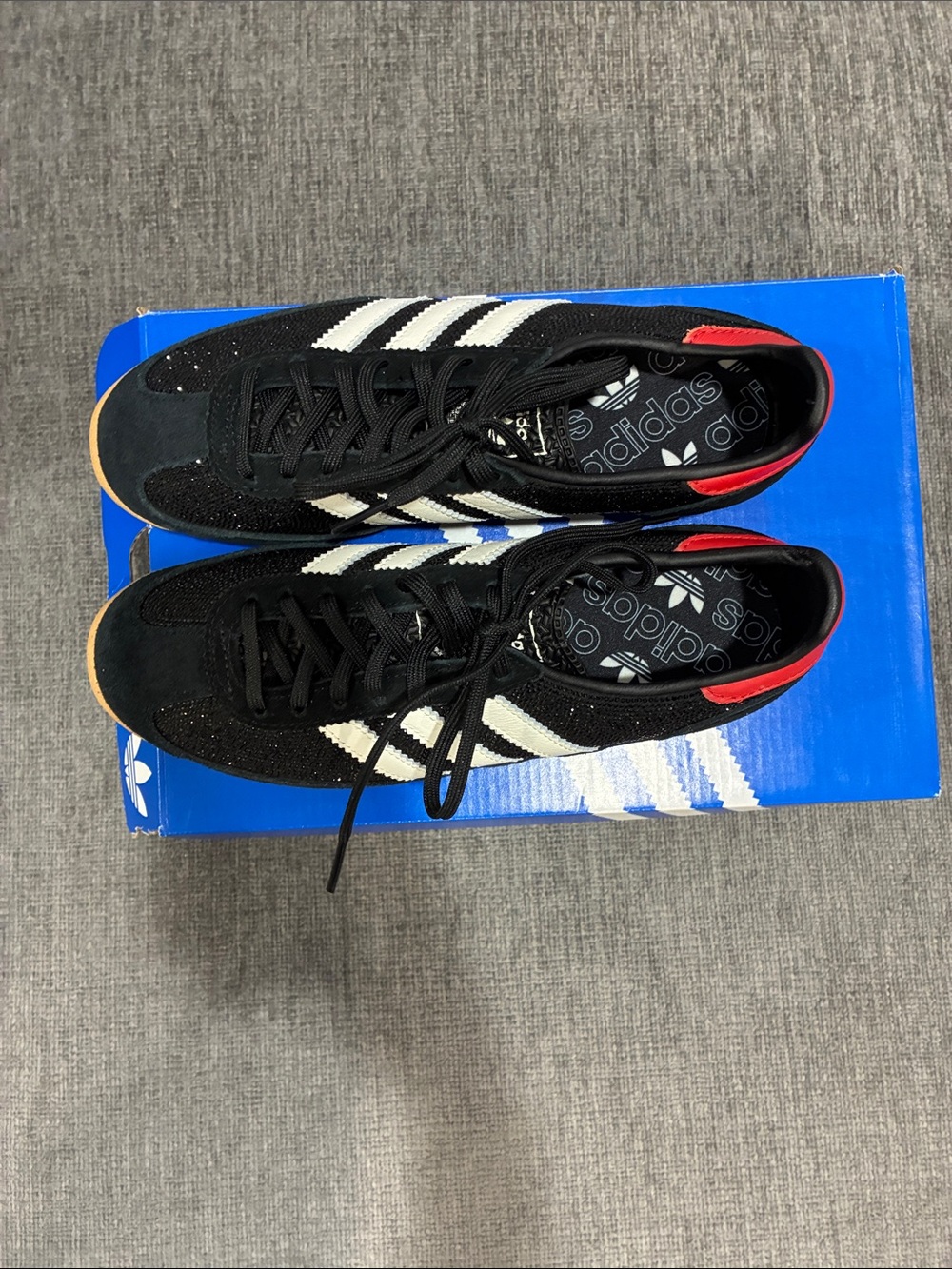 adidas Black Sneakers with White Three Stripes and Red Heel